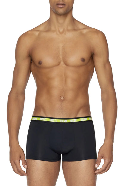 Diesel black boxer shorts with neon green logo waistband, front view