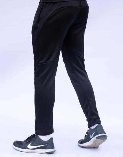 Black jogger pants with front diagonal panels and fitted cuff