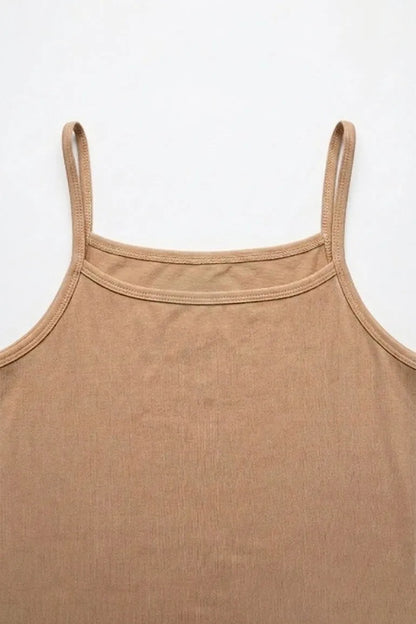 Skin-tan camisole with thin spaghetti straps and ribbed neckline
