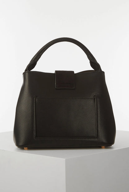 Black structured handbag with top handle and front flap pocket with snap