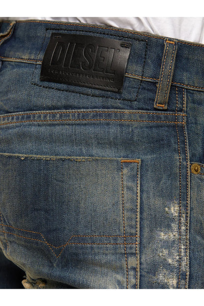 Blue jeans back yoke with leather brand label patch