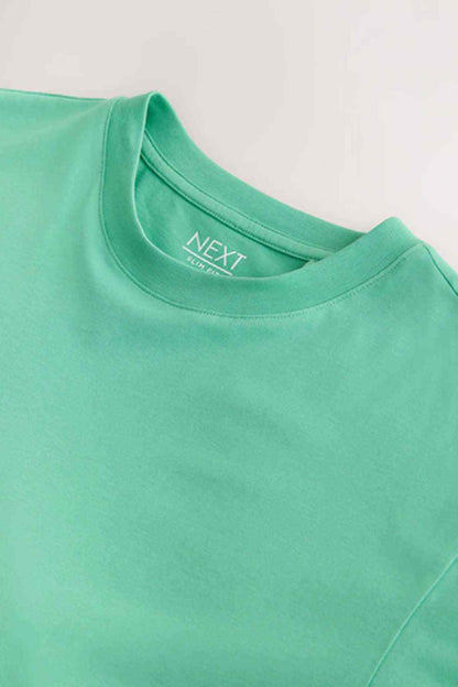 Mint green T-shirt neckline with NEXT branding