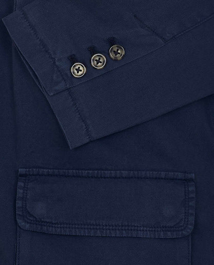 Navy blue shirt close-up: buttoned placket and chest pocket with flap
