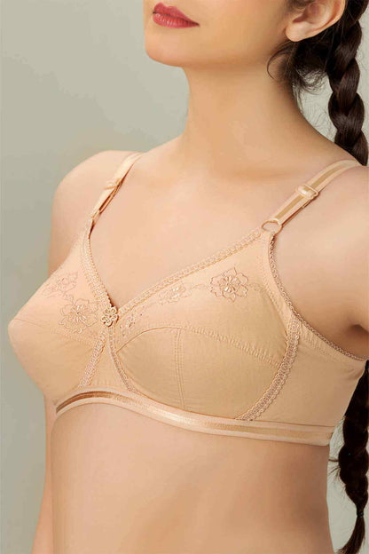 Nude lace-trim bra with floral embroidery cups and adjustable shoulder straps