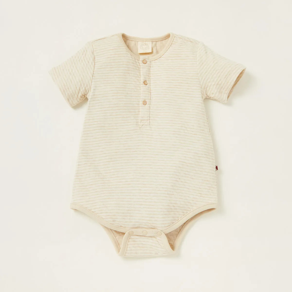 Beige striped short-sleeve bodysuit with button placket and snap legs