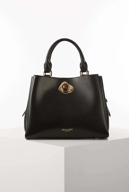 Black structured handbag with top handles and gold clasp closure