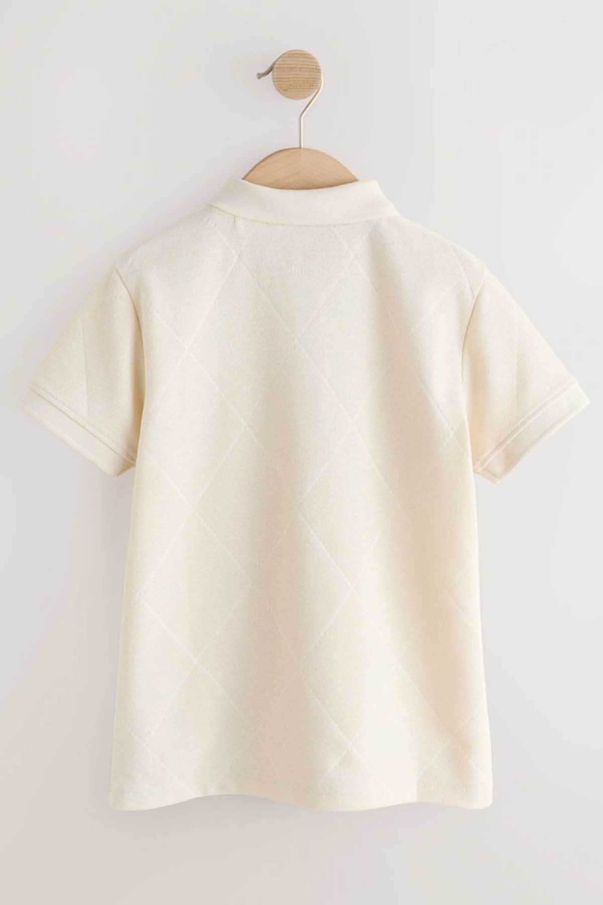 NEXT cream polo shirt on hanger, back view with short sleeves