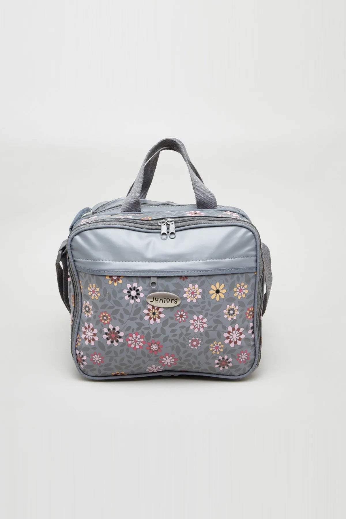 Grey floral diaper bag with front zip pocket and adjustable shoulder strap