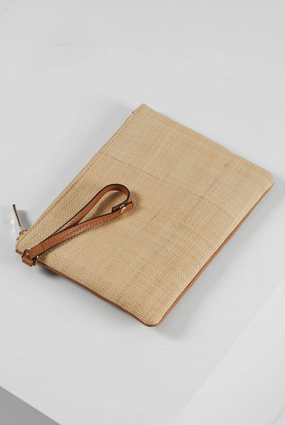 Woven zip pouch clutch with brown wrist strap and leather trim