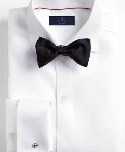 Fitted dress shirt in white with black bow tie and button front