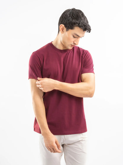 Men's maroon cotton T-shirt with crew neck and short sleeves, side view