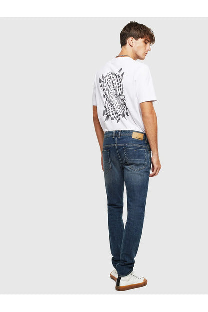 Men's blue denim jeans on model in side view