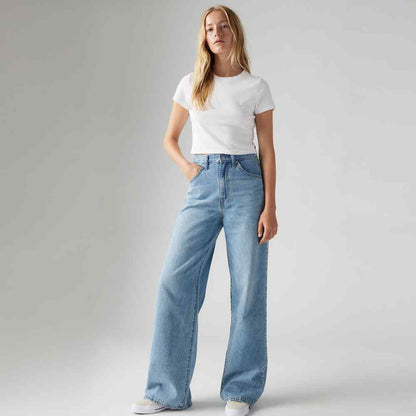 Levi's light blue denim wide-leg jeans, relaxed fit, visible belt loops