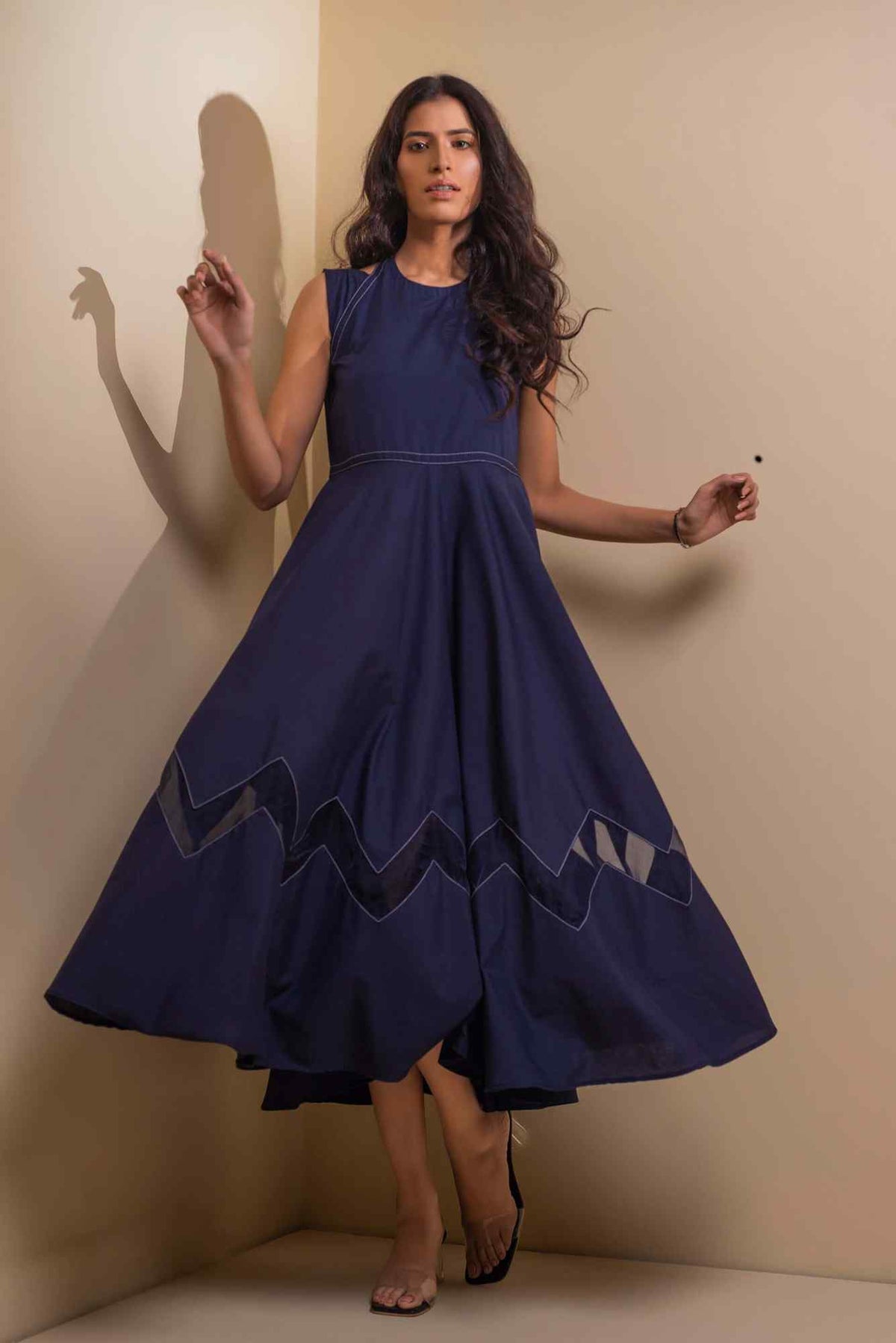 Blue sleeveless velour midi dress with flared skirt and chevron border hem