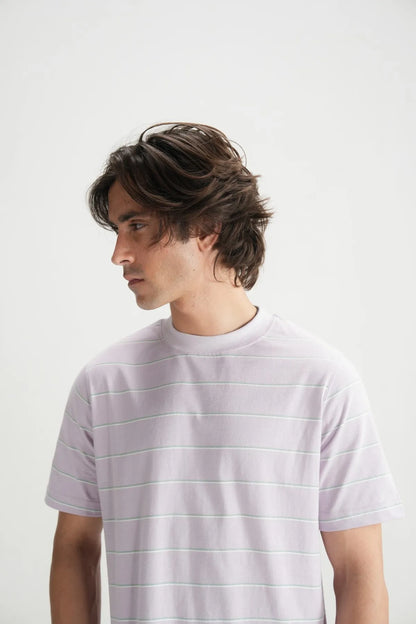Men's lavender crewneck T-shirt with thin horizontal stripes, side profile, short sleeves