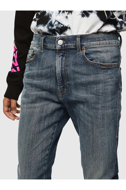Blue denim jeans with belt loops and stitched front pockets, button fly