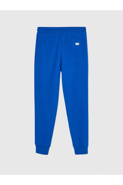 Blue sweatpants back with patch pocket and ribbed cuffs