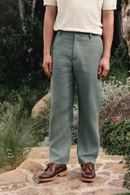 Men's green suit trousers with belt loops and front fly