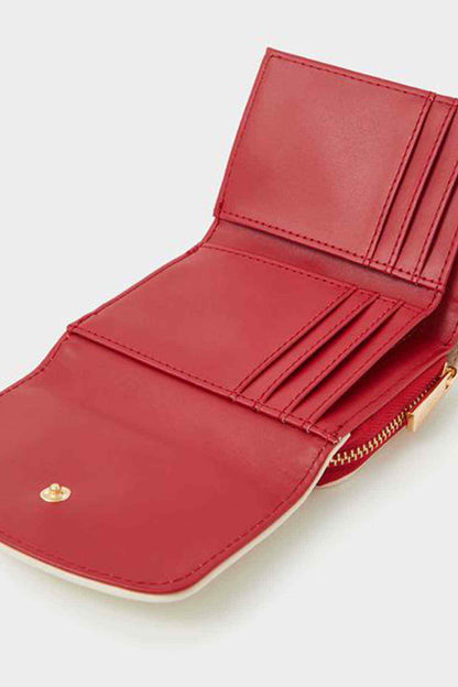 Red zip wallet interior with card slots and coin pocket