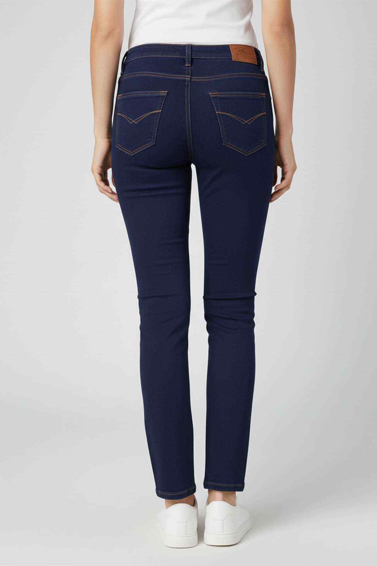 Navy blue skinny jeans, back view with five pockets and stitched detail