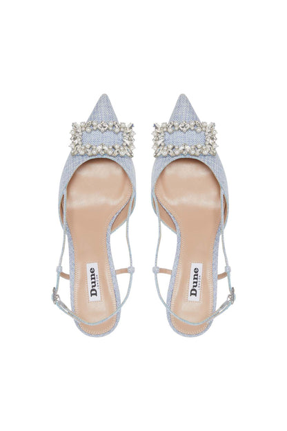Pair of blue slingback heels with rhinestone crown embellishments and ankle straps