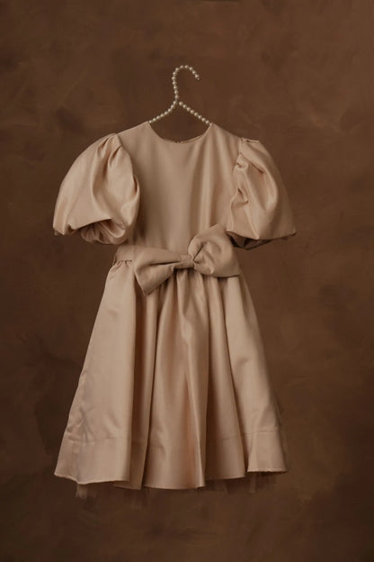 Beige puff-sleeve dress with bow waist tie and flared gathered skirt
