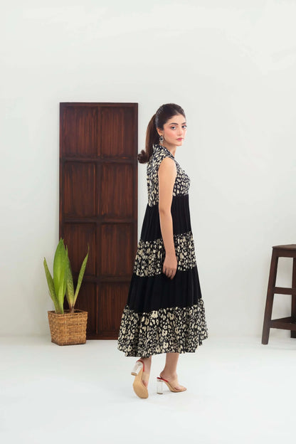 Velour sleeveless tiered dress, black with cream floral print, side profile