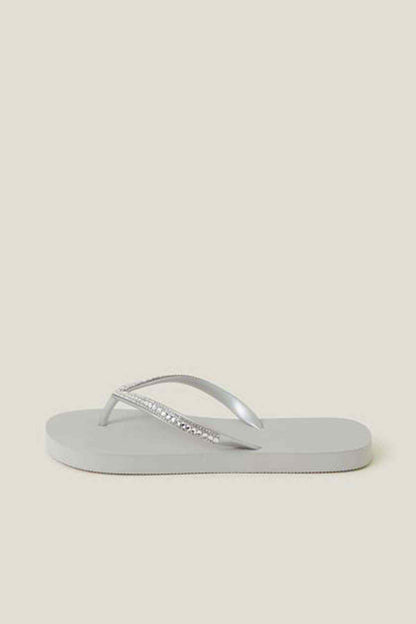 Silver rhinestone flip-flops with V-banded straps
