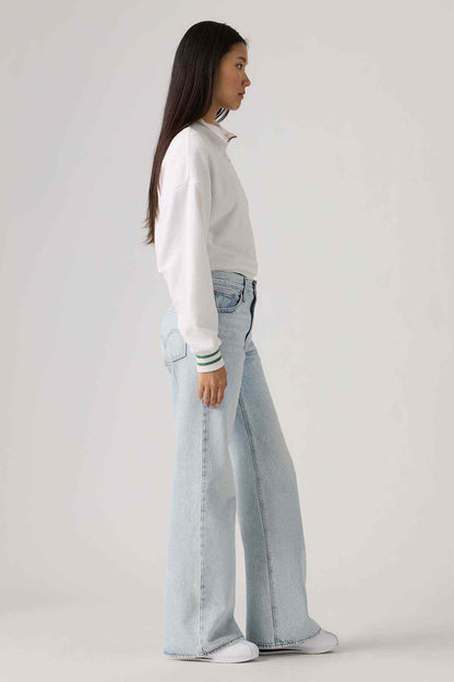 Levi's light indigo denim jeans, side view with classic five-pocket styling