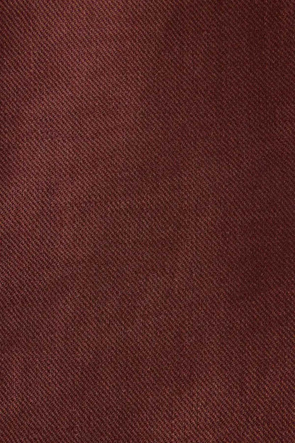 Brown textured suit fabric close-up with fine woven pattern