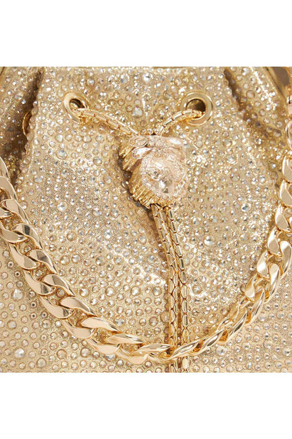 Gold sequin bucket bag close-up of drawstring cord and hardware detail