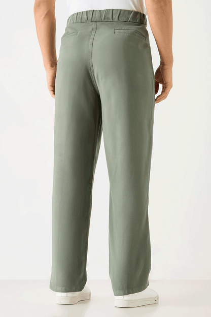 Men's sage green trousers with straight legs and back yoke
