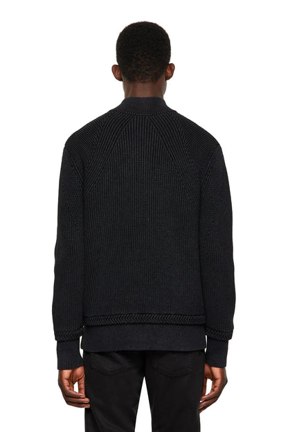 Back view of black knit zip-up jacket with ribbed hem and cuffs