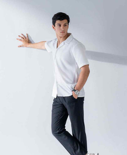 White fitted short-sleeve button-up shirt with pointed collar and buttoned placket
