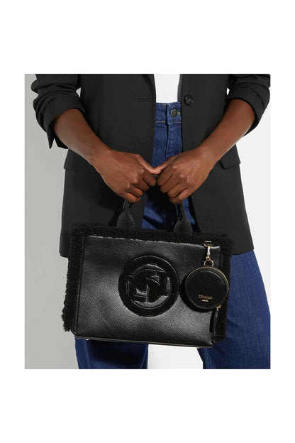 Black fuzzy-trim handbag with top handle, circular logo front, and gold-tone chain strap.
