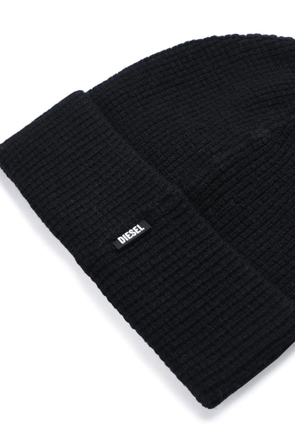 Black knit beanie with Diesel logo on cuff