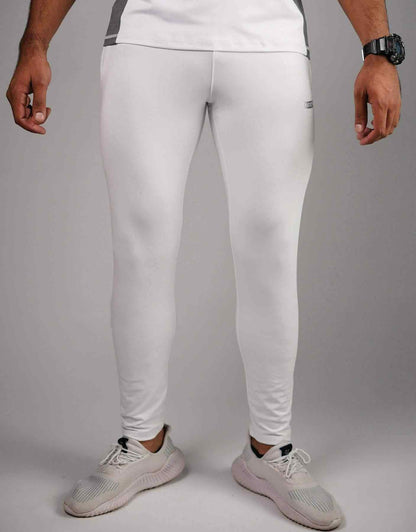 White compression leggings with streamlined legs and black-trim waistband