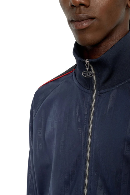 Diesel blue track jacket close-up of stand collar zipper with metal D-ring