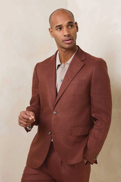Brown three-piece suit with jacket, vest, and matching trousers
