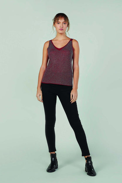 Red sleeveless V-neck tank top with textured allover pattern