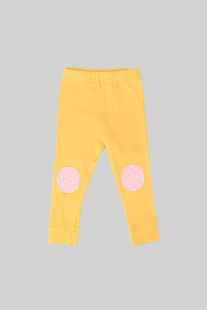 Baby pajama pants in yellow with pink dotted knee patches