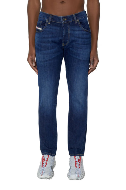 Diesel blue denim jeans with straight legs, belt loops, and five-pocket styling