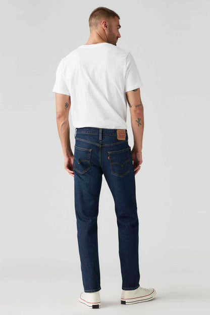 Dark indigo denim jeans, straight leg, five-pocket with back yoke and patch pockets
