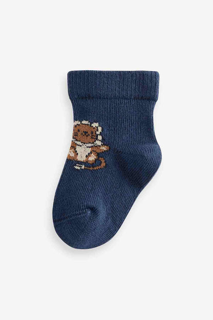 Navy baby sock with pixel bear design on the ankle