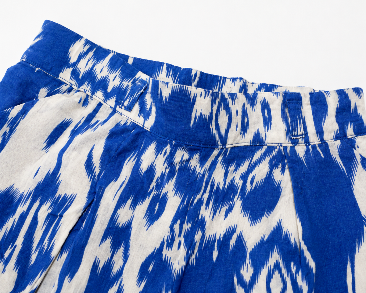 Blue and white patterned shorts with stitched elastic waistband