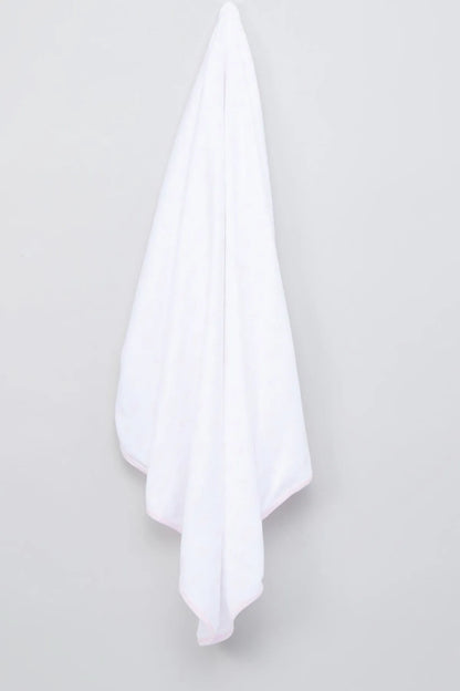BABYSHOP baby blanket draped white, soft pink trim