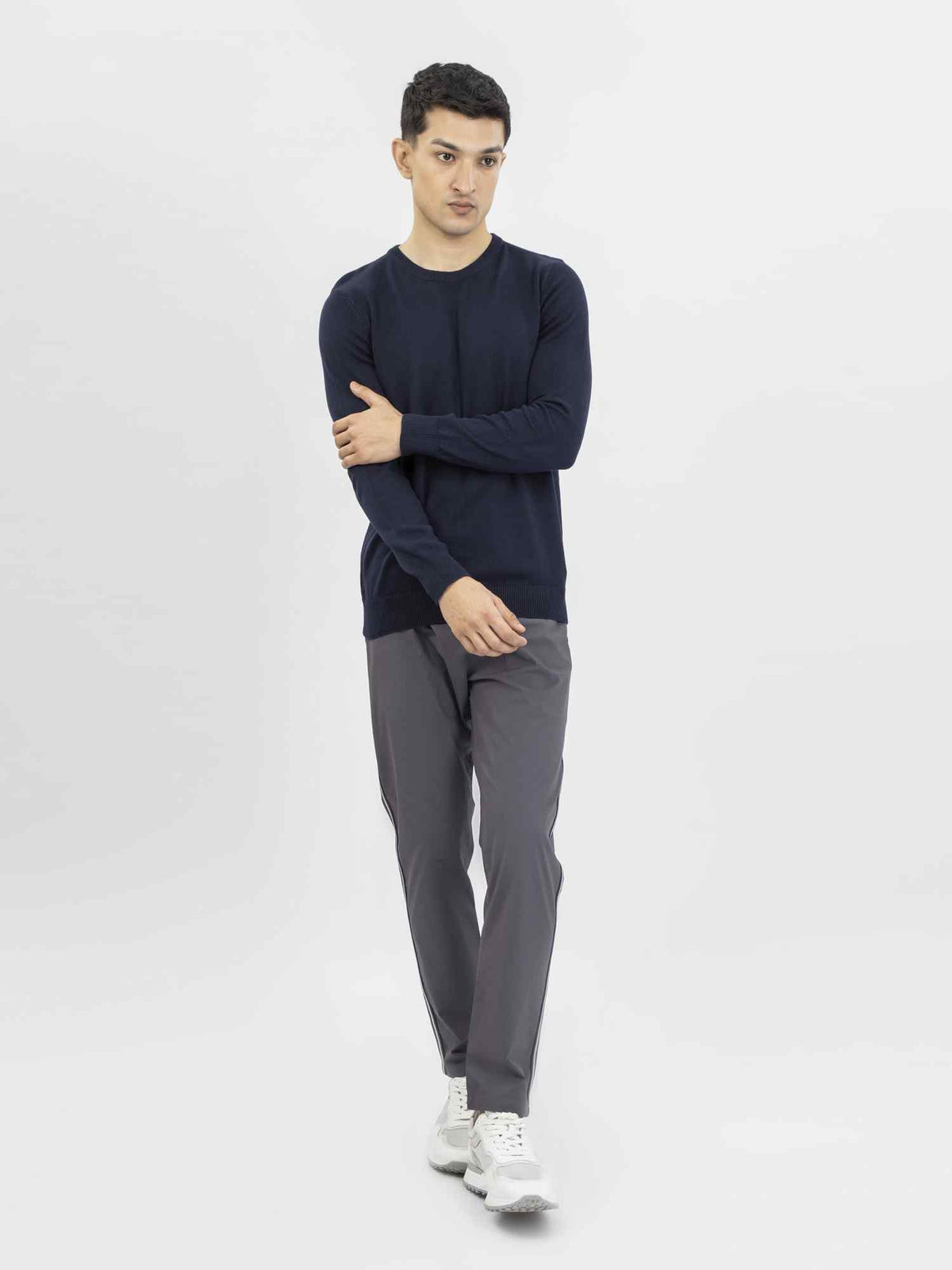 Men's dark blue crewneck knit sweater, full view with ribbed hem and cuffs