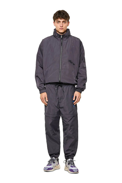 Dark navy pants with drawstring waist and elastic cuffs, full-length fit