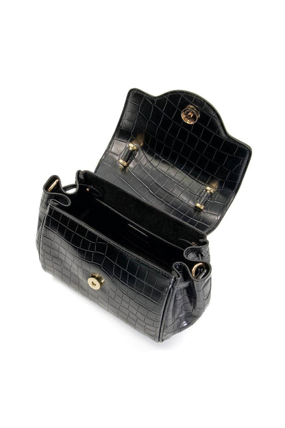 Black croc-embossed backpack-style mini bag with gold buckles and top handle