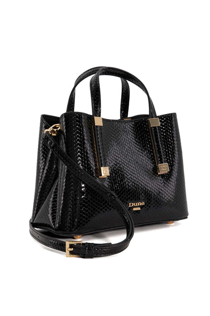 Black textured mini tote with long strap, top handles, and gold-tone hardware